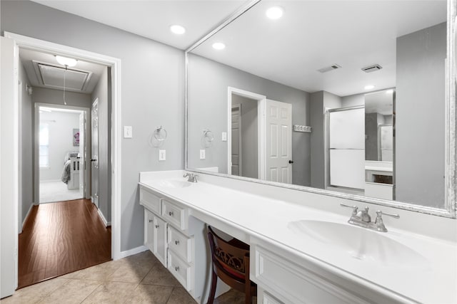 bathroom featuring tile patterned floors and vanity