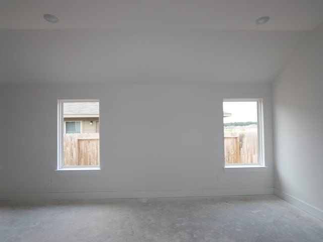 740 Autumn Cherry Trl, Magnolia, TX 77354 - empty room featuring baseboards and concrete floors