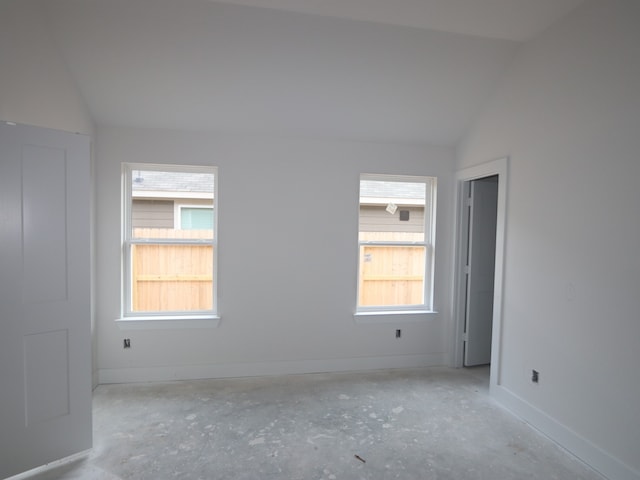740 Autumn Cherry Trl, Magnolia, TX 77354 - spare room featuring vaulted ceiling and baseboards