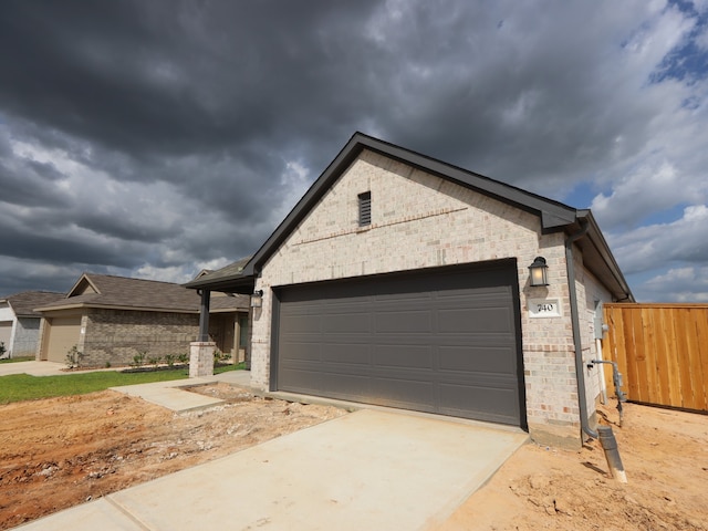 740 Autumn Cherry Trl, Magnolia, TX 77354 - ranch-style home featuring brick siding, driveway, and an attached garage