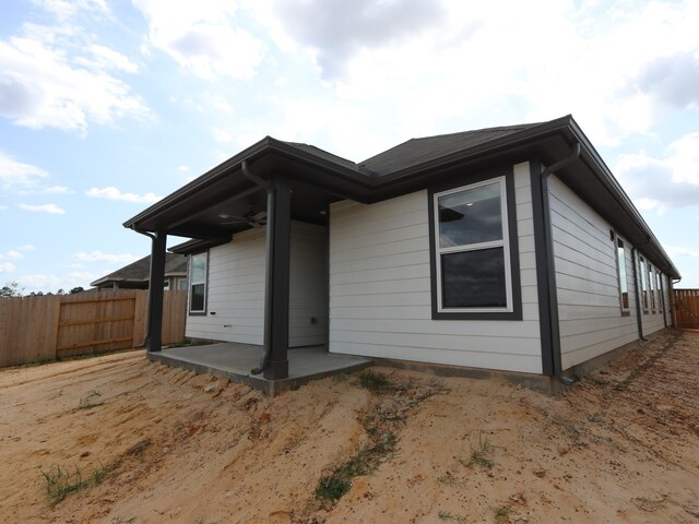 740 Autumn Cherry Trl, Magnolia, TX 77354 - rear view of house featuring a patio area and a ceiling fan
