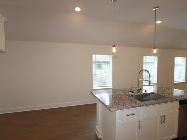 740 Autumn Cherry Trl, Magnolia, TX 77354 - kitchen featuring dark wood finished floors, stainless steel dishwasher, light stone counters, white cabinets, and lofted ceiling