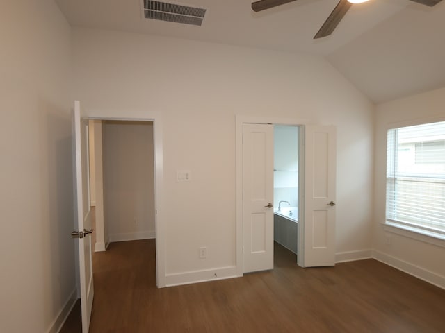 740 Autumn Cherry Trl, Magnolia, TX 77354 - unfurnished bedroom with dark wood finished floors, lofted ceiling, and a ceiling fan