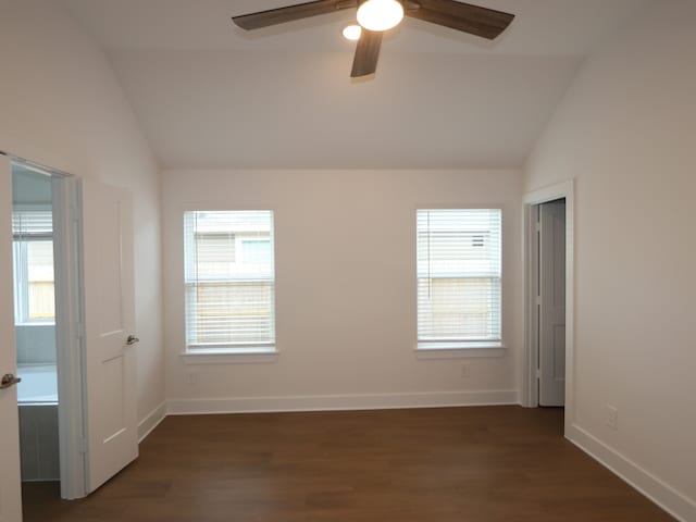 740 Autumn Cherry Trl, Magnolia, TX 77354 - empty room featuring vaulted ceiling, a ceiling fan, and dark wood finished floors