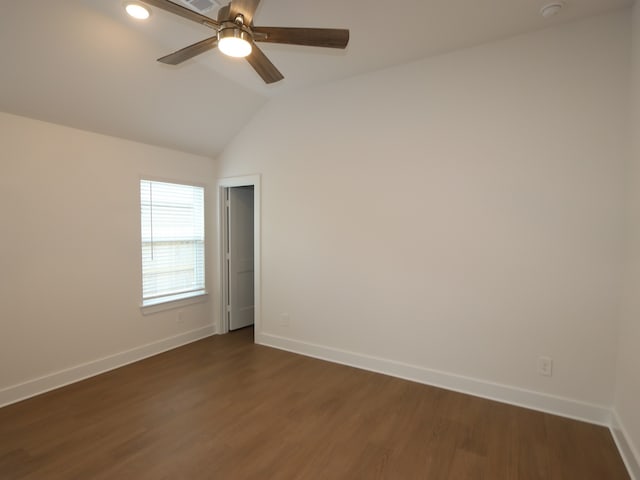 740 Autumn Cherry Trl, Magnolia, TX 77354 - spare room with a ceiling fan, dark wood-type flooring, lofted ceiling, and a smoke detector