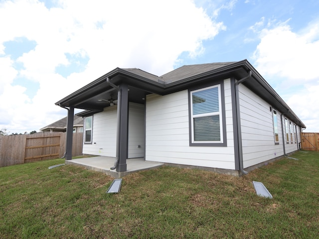740 Autumn Cherry Trl, Magnolia, TX 77354 - rear view of house featuring ceiling fan, a patio area, and a fenced backyard