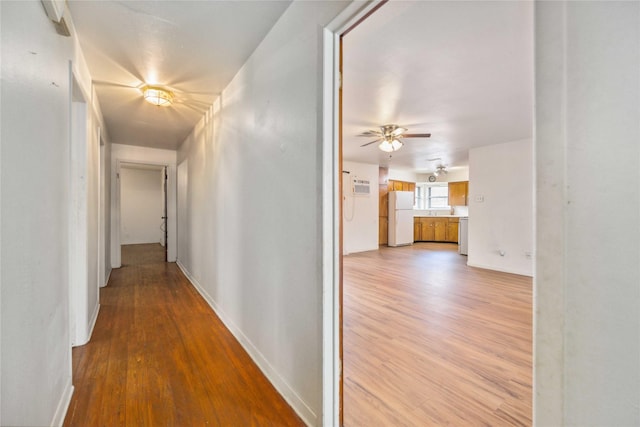 hallway featuring light hardwood / wood-style flooring