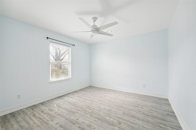 unfurnished room featuring ceiling fan and light wood-type flooring