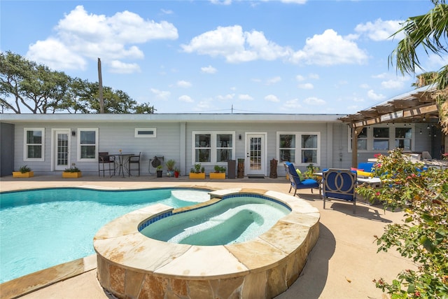 view of swimming pool featuring an in ground hot tub, a pergola, and a patio