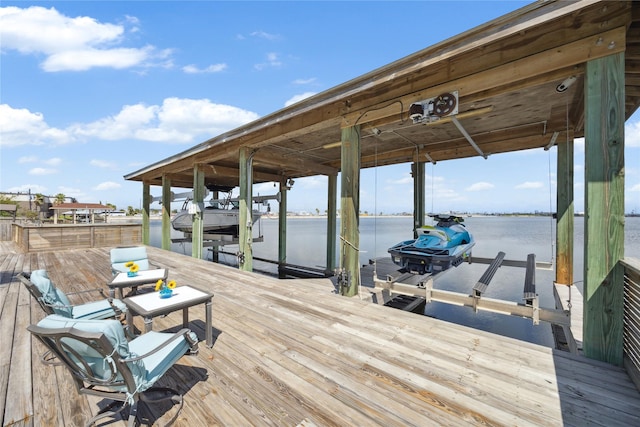 view of dock with a water view