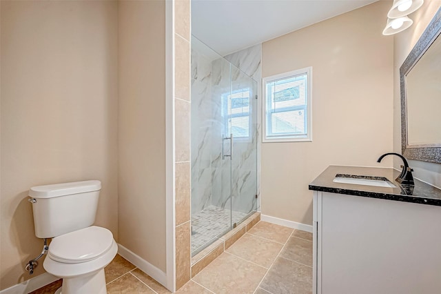 bathroom with tile patterned floors, vanity, toilet, and an enclosed shower