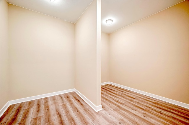 unfurnished room with light hardwood / wood-style floors