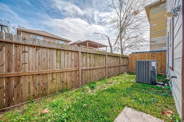 view of yard featuring central AC