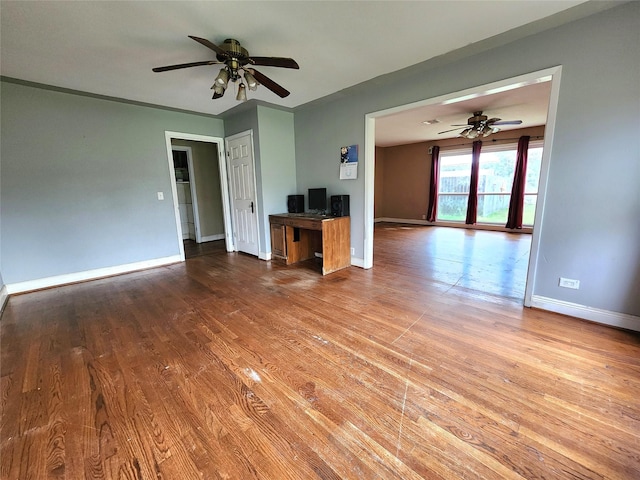 unfurnished living room with ceiling fan and light hardwood / wood-style floors