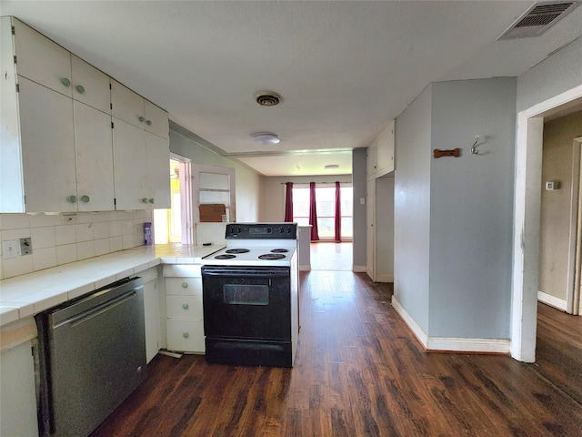 kitchen with white cabinets, tile counters, range with electric cooktop, and stainless steel dishwasher