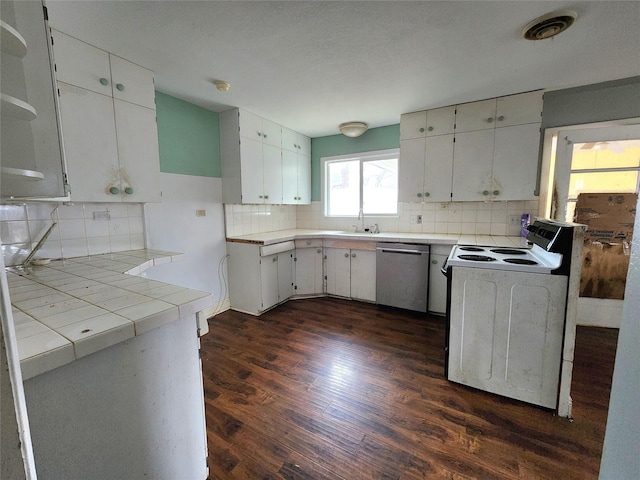 kitchen featuring white cabinets, electric range, dishwasher, and dark wood-type flooring