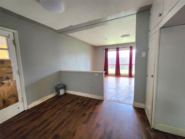 spare room featuring dark hardwood / wood-style floors