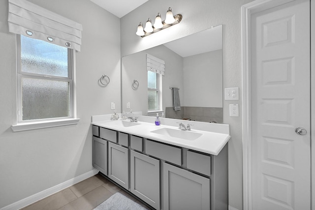 bathroom with vanity and tile patterned flooring