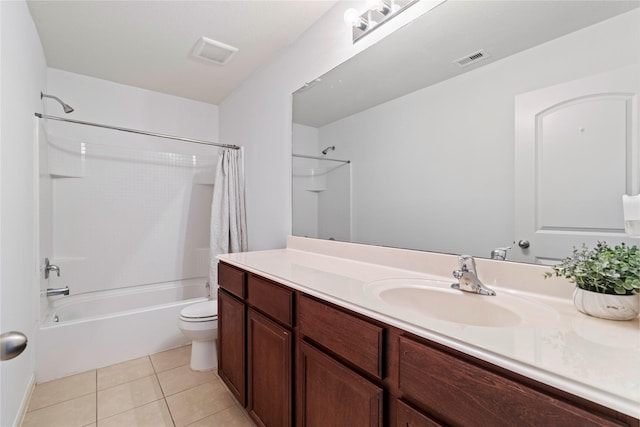 full bathroom with tile patterned flooring, vanity, shower / bath combination with curtain, and toilet