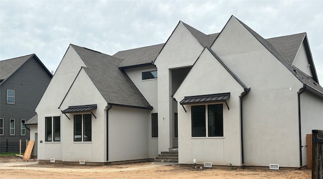 6104 T St, Katy, TX 77493 - rear view of property with stucco siding and roof with shingles