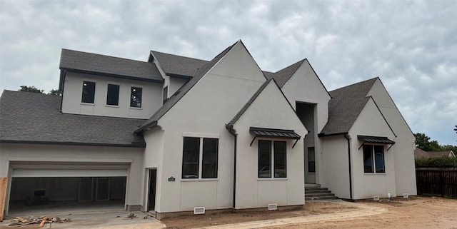 6104 T St, Katy, TX 77493 - view of front of house with an attached garage, roof with shingles, and concrete driveway