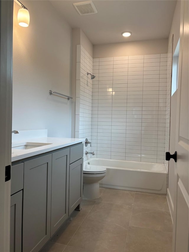 6104 T St, Katy, TX 77493 - bathroom with vanity, toilet, tile patterned floors, shower / tub combination, and recessed lighting
