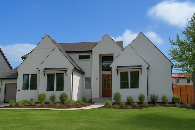 6104 T St, Katy, TX 77493 - view of front of property featuring a garage and stucco siding