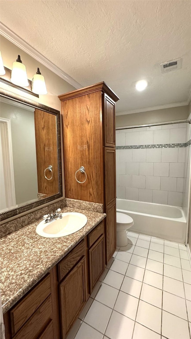 full bathroom with tiled shower / bath, ornamental molding, tile patterned flooring, and vanity