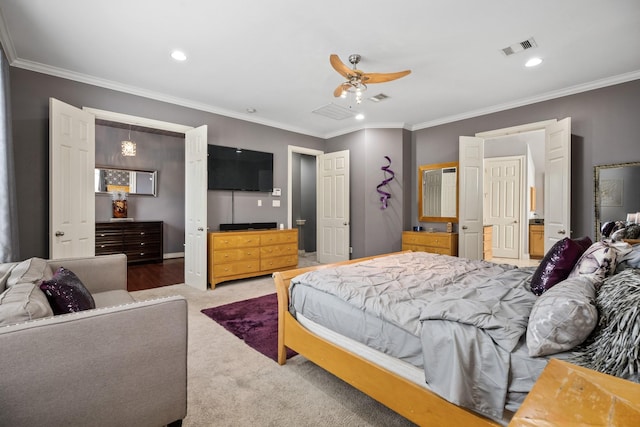 bedroom with ornamental molding, ceiling fan, and carpet