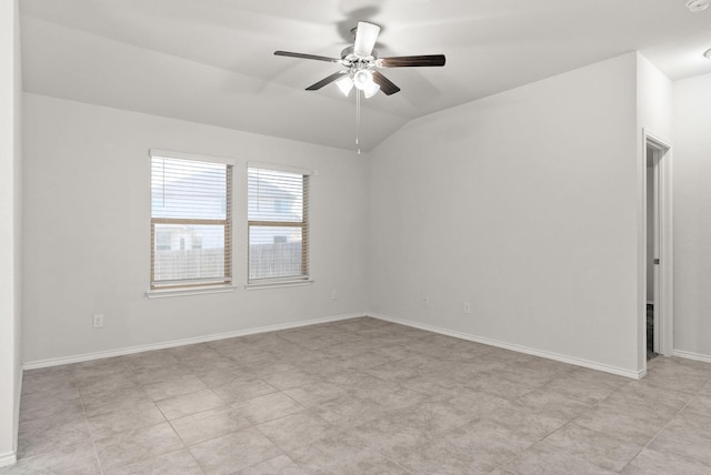 unfurnished room with vaulted ceiling and ceiling fan