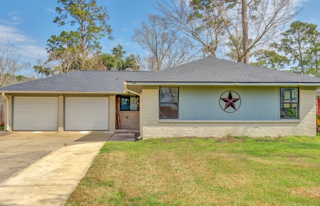 ranch-style house with a front yard and a garage