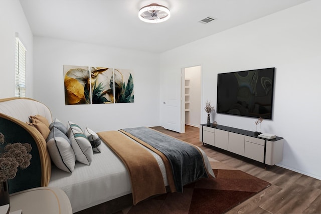 bedroom featuring hardwood / wood-style flooring