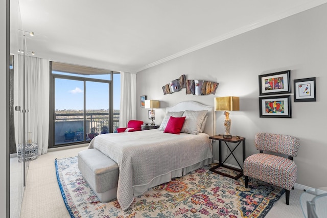 bedroom featuring floor to ceiling windows, ornamental molding, light carpet, and access to outside