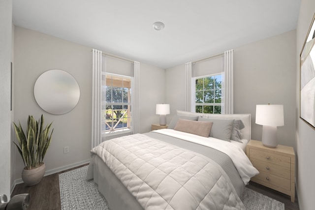 bedroom featuring dark wood-type flooring