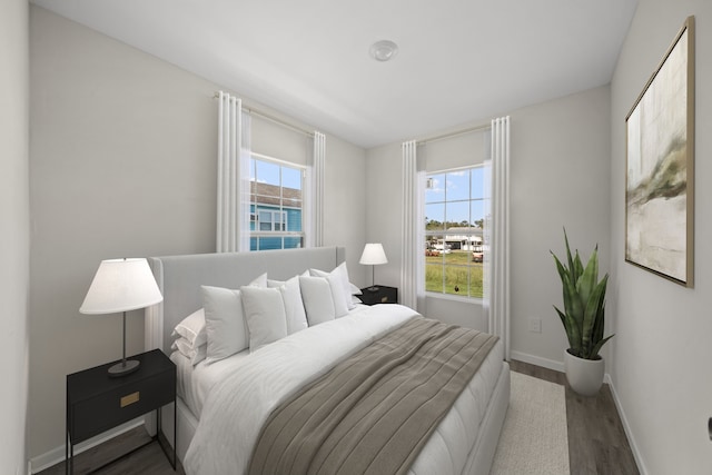 bedroom featuring dark hardwood / wood-style flooring