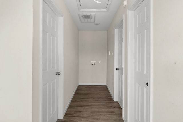 hallway with dark hardwood / wood-style floors