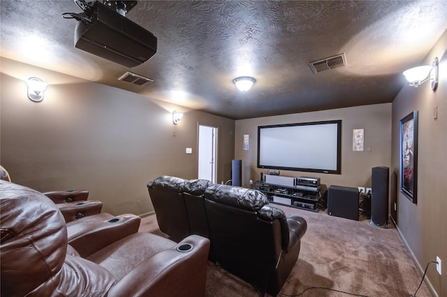 carpeted home theater with baseboards, visible vents, and a textured ceiling