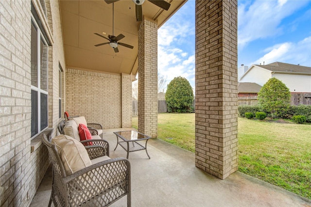 view of patio with a ceiling fan, outdoor lounge area, and fence