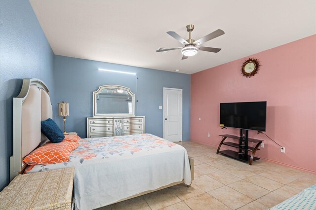 bedroom with light tile patterned floors and ceiling fan