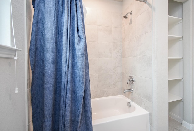 bathroom featuring shower / bath combination with curtain