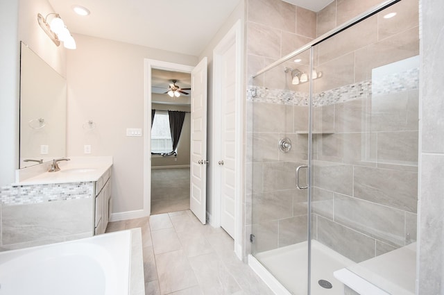 bathroom featuring independent shower and bath, vanity, tile patterned flooring, and ceiling fan