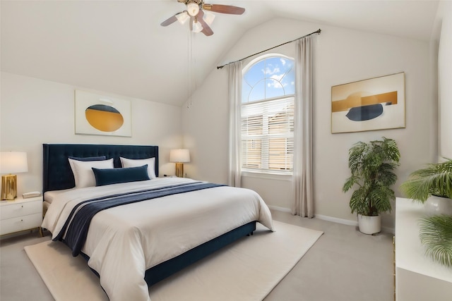 bedroom featuring light carpet, vaulted ceiling, baseboards, and ceiling fan