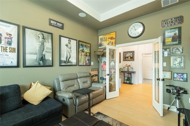 interior space featuring light wood-type flooring and french doors