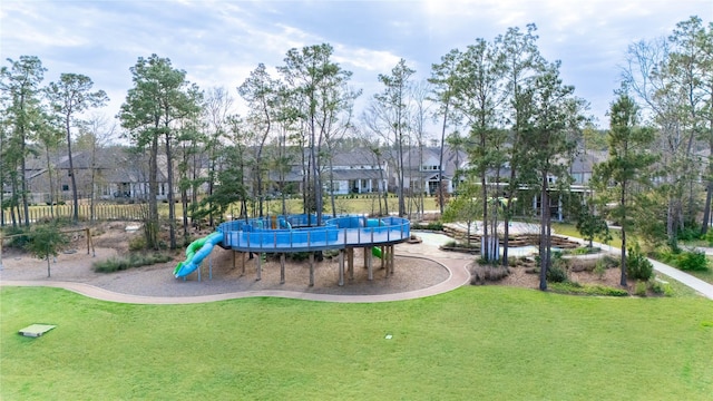 view of playground with a yard