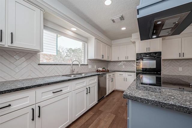 kitchen featuring sink, dark wood-type flooring, white cabinetry, range hood, and black appliances