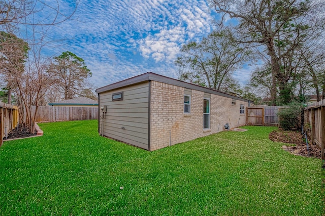 exterior space with a yard