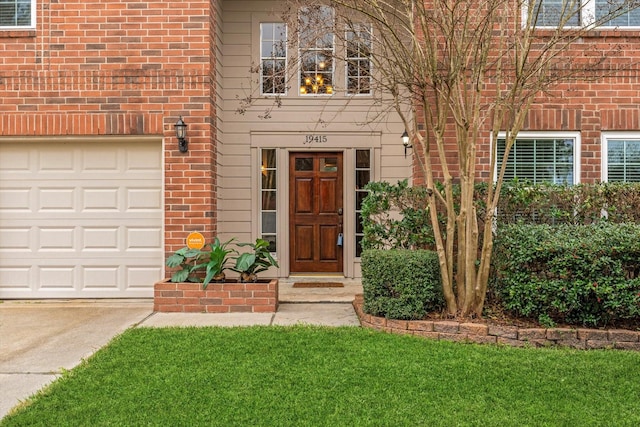 doorway to property featuring brick siding