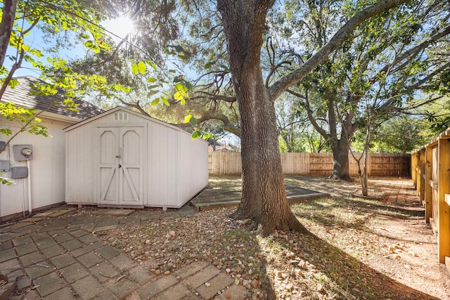 view of shed with a fenced backyard