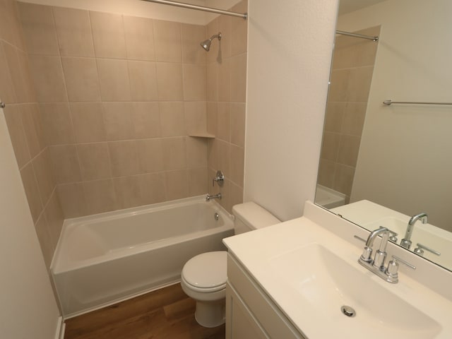 26235 Astral Way, La Marque, TX 77568 - full bath featuring wood finished floors, toilet, shower / bath combination, and vanity