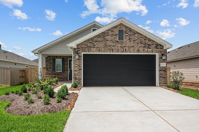 26235 Astral Way, La Marque, TX 77568 - single story home with driveway, a garage, and brick siding